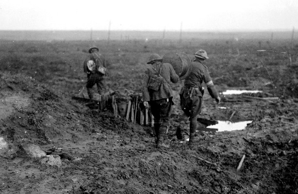 New Zealand signallers running out wire on the Western Front, 1917