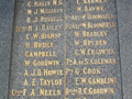 List of names inscribed on stone in gold lettering