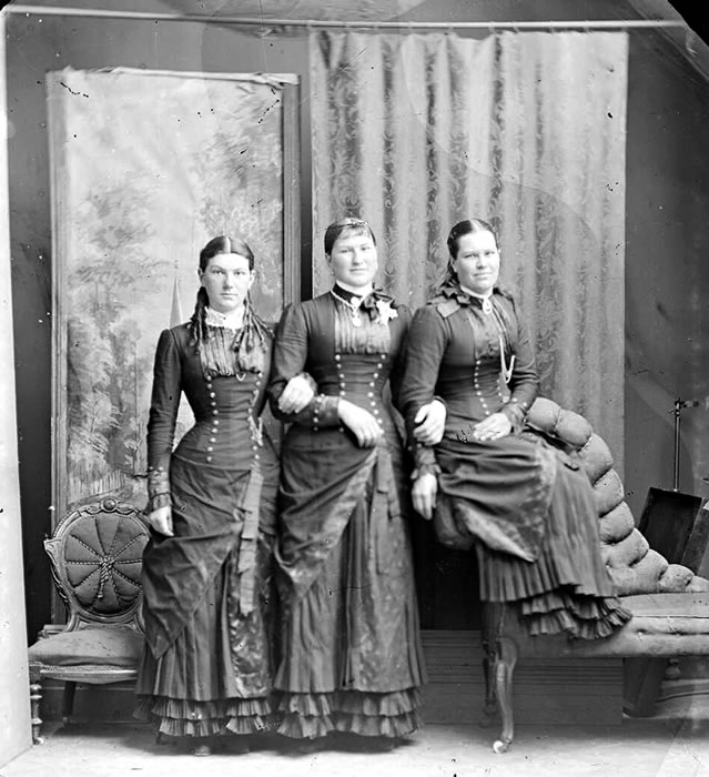Three women in tight clothing