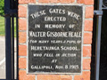 View of brick and wrought-iron gates at the entrance of Hereworth School grounds. Includes plaque to former pupil Walter Gisborne Heale who was killed at Gallipoli during the First World War.
