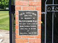 View of brick and wrought-iron gates at the entrance of Hereworth School grounds. Includes plaque to former pupil Walter Gisborne Heale who was killed at Gallipoli during the First World War.