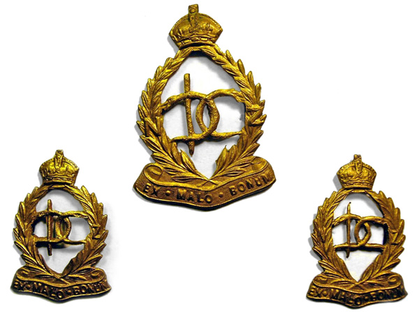 Cap and shoulder badges for NZDC
