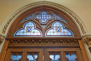 Stained-glass window above door