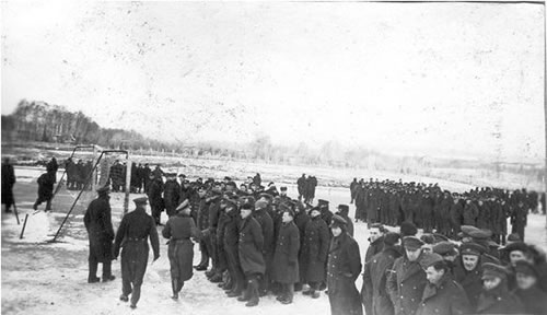 prisoners standing to attention in snow