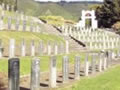 Graves beside the Taita Cemetery war memorial