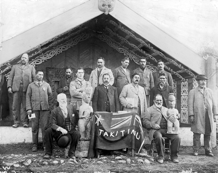 Members who attended the first meeting of the Tākitimu Maori Council in 1902 pose in front of the second Te Poho o Rāwiri meeting house in Gisborne