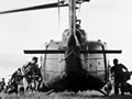 Troops boarding helicopter, circa 1970