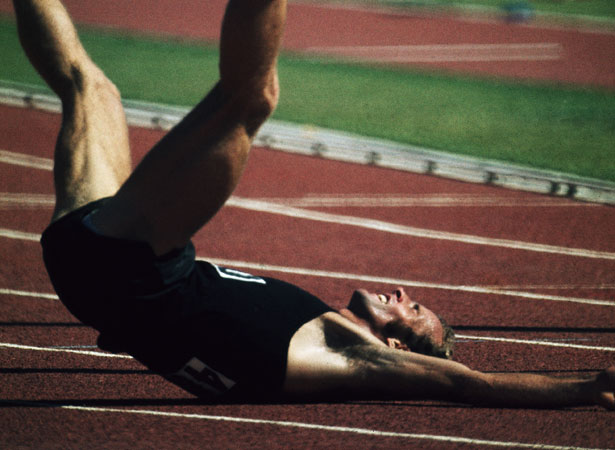 Dick Tayler collapses after winning the 10,000 m