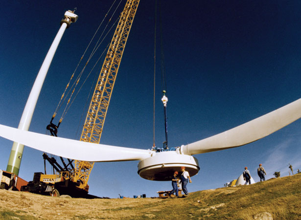 Large propellor being hoisted up by a crane