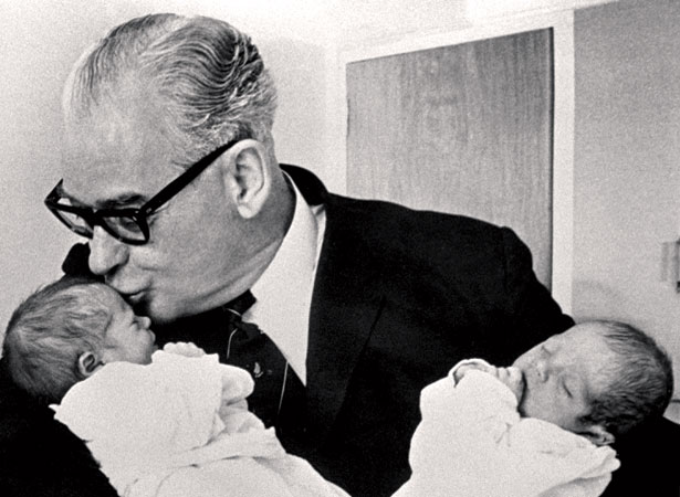Keith Holyoake with his twin grandchildren