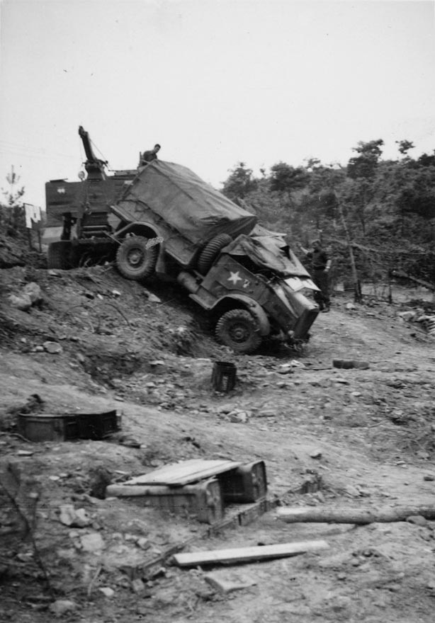 Quad tractor towing 25-pounder in Korea