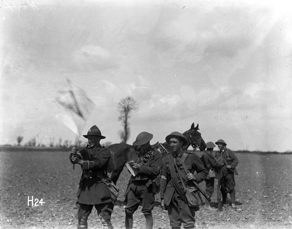 New Zealand troops signalling with flag