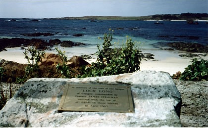 Plaque on beach with inscription, 'In memory of the crew of the barque Loch Long'