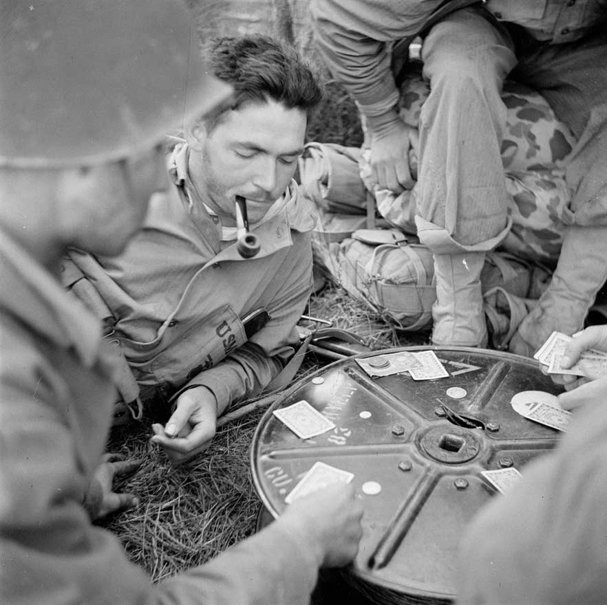 American servicemen playing cards