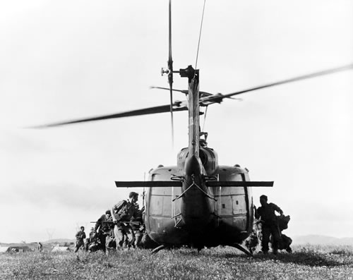Infantry troops boarding a helicopter, c1970s