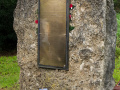 View brass plaque with list of names inlaid into a piece of rock