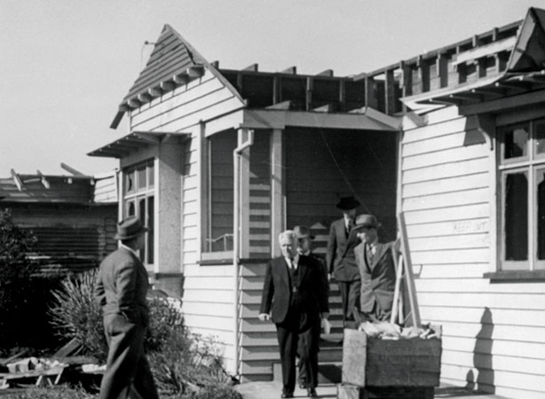 Walter Nash visits a tornado-damaged house in Frankton