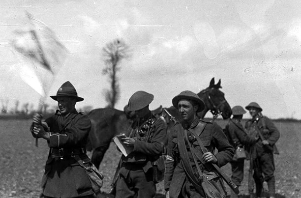 New Zealand troops signalling with flag, Western Front, 1917