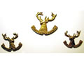 Collar and cap badges