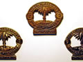 Collar and cap badges