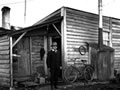 Joseph Divis outide his Waiuta house