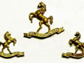 Collar and cap badges