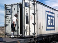 MAF inspector checking container