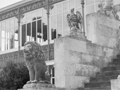 Stone entrance steps featuring large sculptures of a lion and eagle on each side