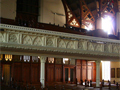 Interior of church with pews and a balcony