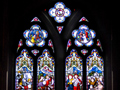 Stained glass windows in arch frame