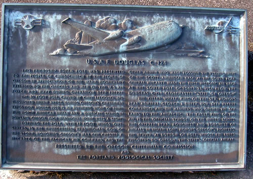 Corroded metal plaque titled USAF Douglas C 124