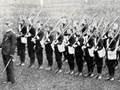 New Plymouth Boys' High School cadets Cadets standing to attention on rugby field