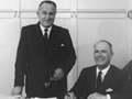 Two men at desk