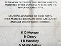 Detail of memorial with words 'Betio Memoria Tarawa. In memory of the 22 British subjects murdered by the Japanese at Betio on the 15th October 1942' inscribed under a cross.