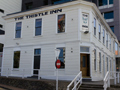 2-storey wooden building on corner