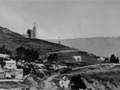 Historic image of Lyttleton showing Timeball on hillside above harbour