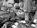 American servicemen playing cards
