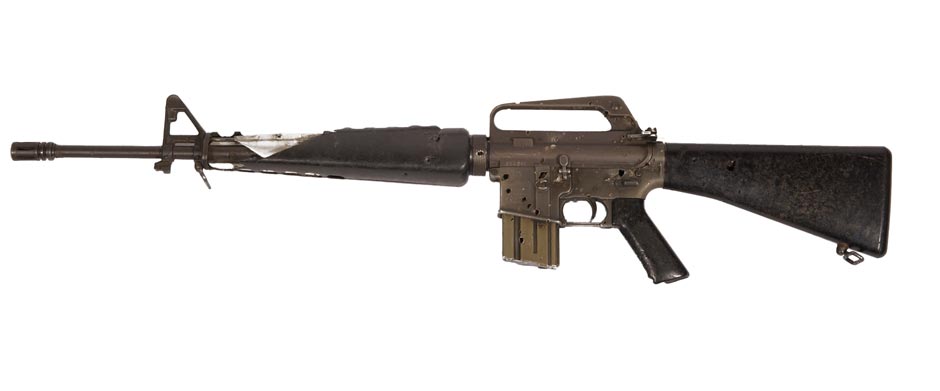 Battle damaged M16 automatic rifle