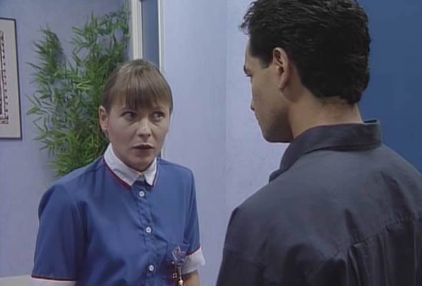 Nurse Carrie Burton talking to Dr Ropata