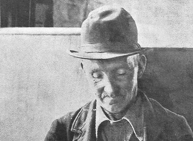 Presenting old-age pension certificate for payment, c. 1899