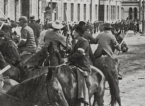Unionists stand their ground as mounted special constables prepare to charge them