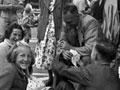 Blenheim family waiting for Royal tour, 1954