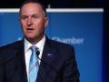 John Key wearing Silver Fern flag pin