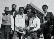 Rua Kēnana and his son Whatu, handcuffed