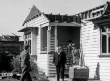 Walter Nash visits a tornado-damaged house in Frankton