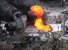 Flames burst from a ventilation shaft at the Pike River mine