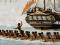 Painting of ships and waka in Wellington Harbour, 1840