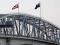 Tino Rangatiratanga flag flying on Auckland Harbour Bridge