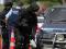 Armed police search a vehicle near Rūātoki