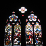 Stained glass window in silhouette.